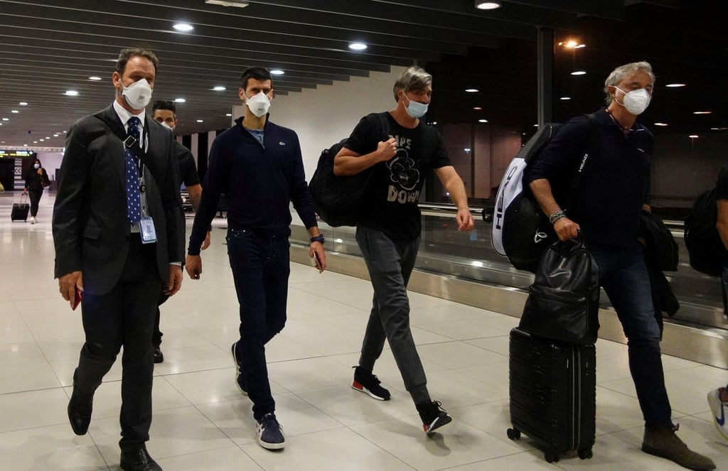 Serbian tennis player Novak Djokovic pictured ahead of his flight in Melbourne Airport. Photo: Reuters Serbian tennis player Novak Djokovic pictured ahead of his flight in Melbourne Airport. Photo: Reuters
