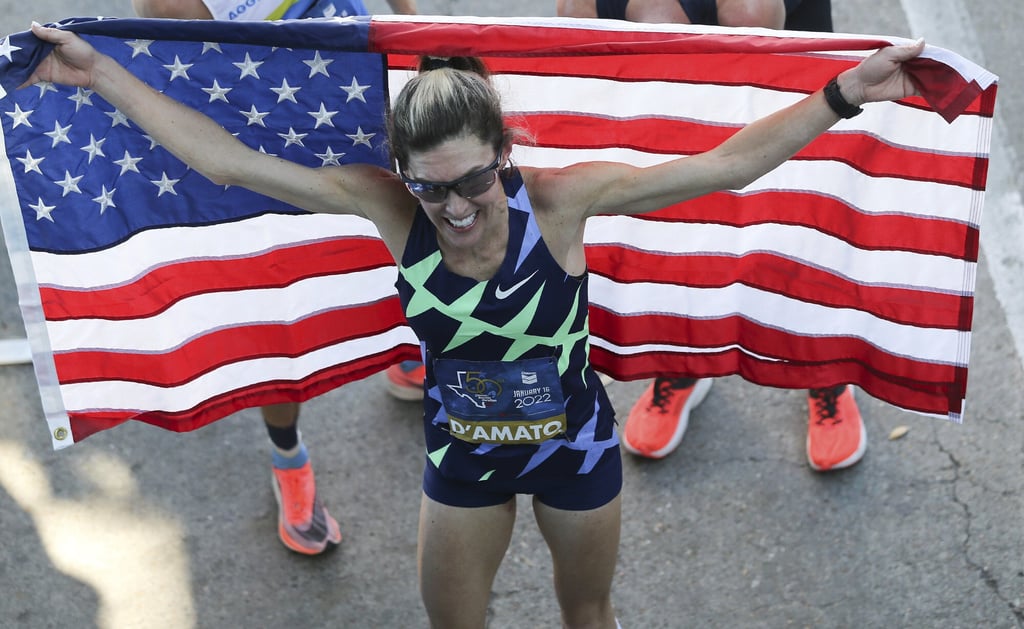 Keira D’Amato celebrates after breaking the American women’s marathon record. Photo: AP