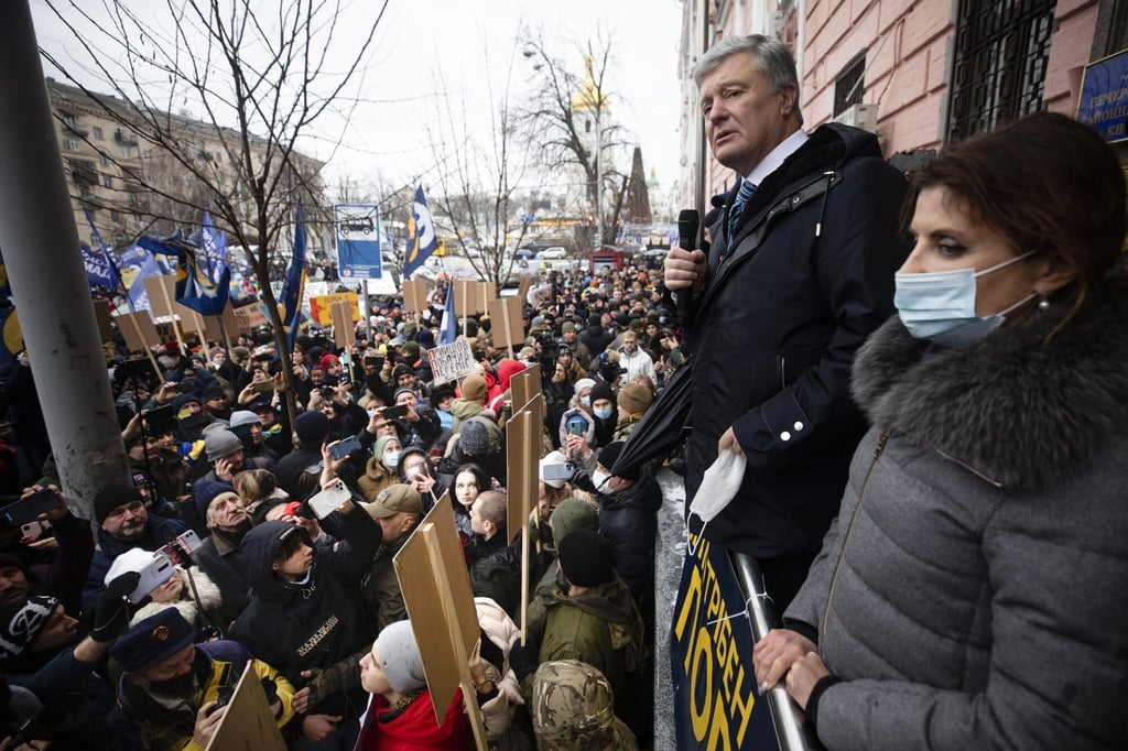 Former Ukrainian President Petro Poroshenko addresses supporters in front of a court building prior to the court session in Kyiv, Ukraine. Photo: AP