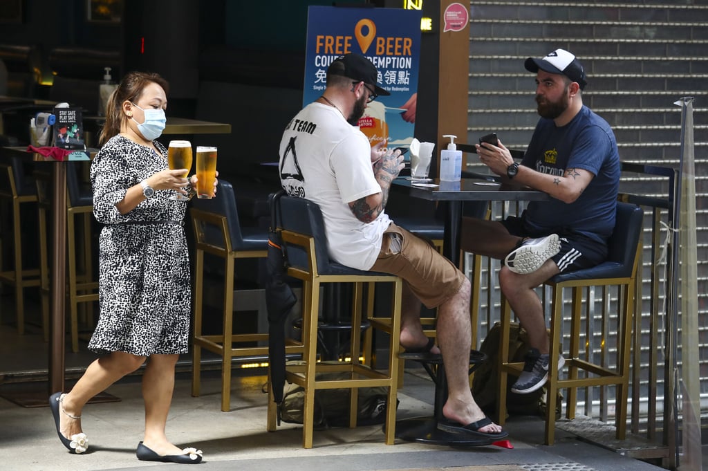 Customers enjoy beers at a bar in Lan Kwai Fong, Central. Photo: Nora Tam Customers enjoy beers at a bar in Lan Kwai Fong, Central. Photo: Nora Tam