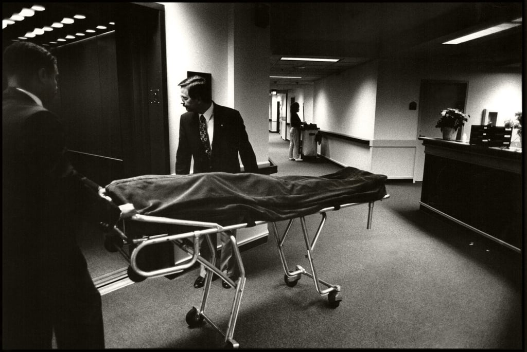Coroners transport an Aids patient’s body to the mortuary in America’s first Aids hospice in Seattle in 1992. Diseases such as HIV, which causes Aids, Ebola and coronaviruses can establish themselves long term in human populations, causing widespread death. Photo: Getty Images