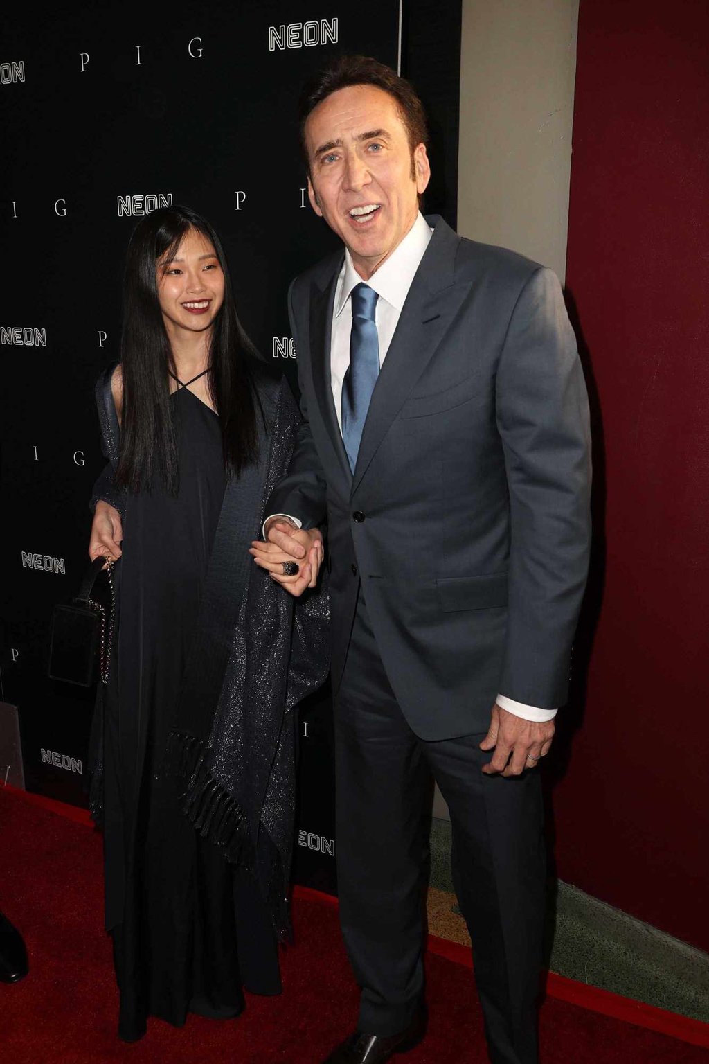 Nicolas Cage and Riko Shibata looking loved up at the premiere of Pig. Photo: Getty