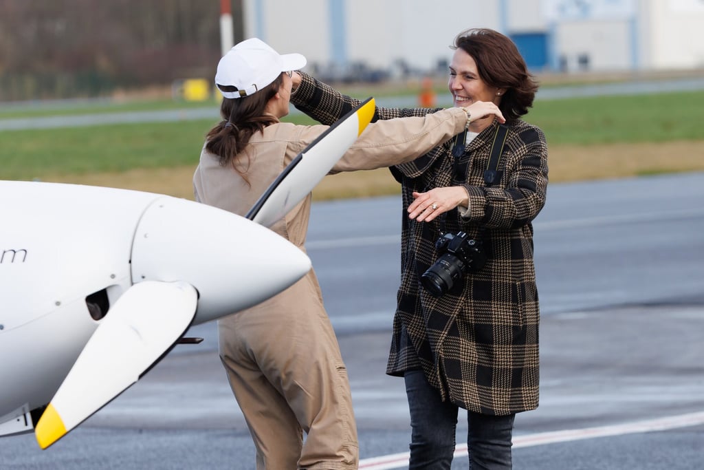 Zara Rutherford hugs her mother Beatrice De Smet at Wevelgem airfield in Belgium after returning from a record journey to become the youngest woman to fly solo around the world in a small plane. Photo: dpa