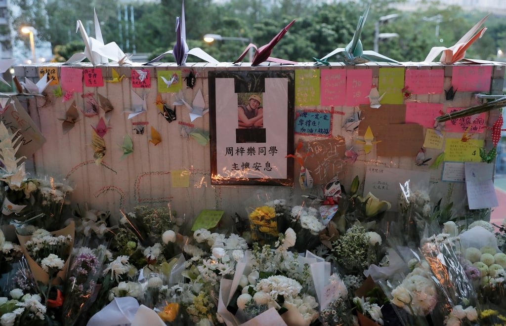 Well-wishers at the car park in Tseung Kwan O where Chow Tsz-lok fell in 2019. Photo: Edmond So