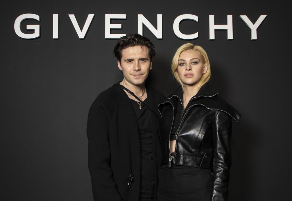 Brooklyn Beckham and Nicola Peltz pose for photographers before the Givenchy spring/summer 2022 ready-to-wear fashion show presented in Paris, in October 2021. Photo: AP