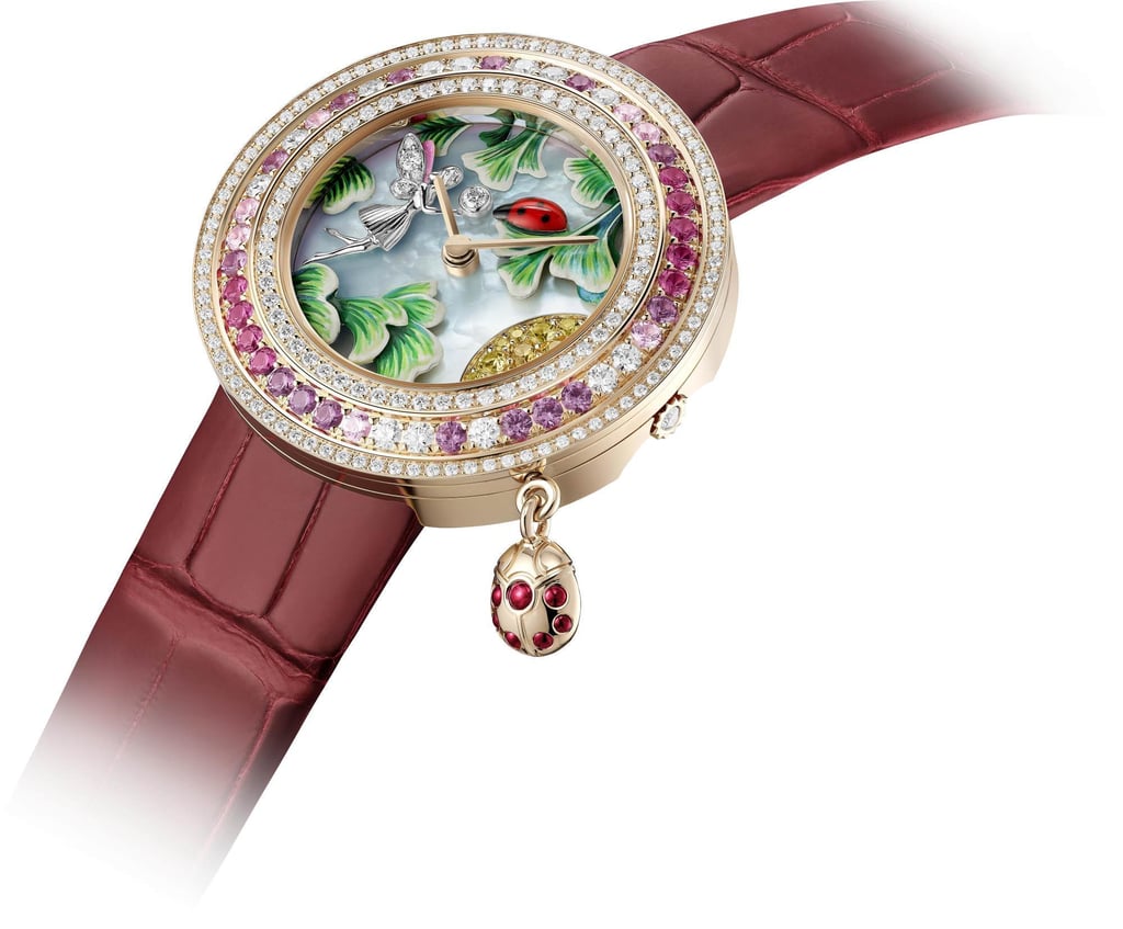 The Charms Coccinelle Féerique watch from Van Cleef & Arpels’ Extraordinary Dials collection with 32mm rose gold case, rose gold bezel, diamonds, pink sapphires, rubies and a rose gold rotating charm.
