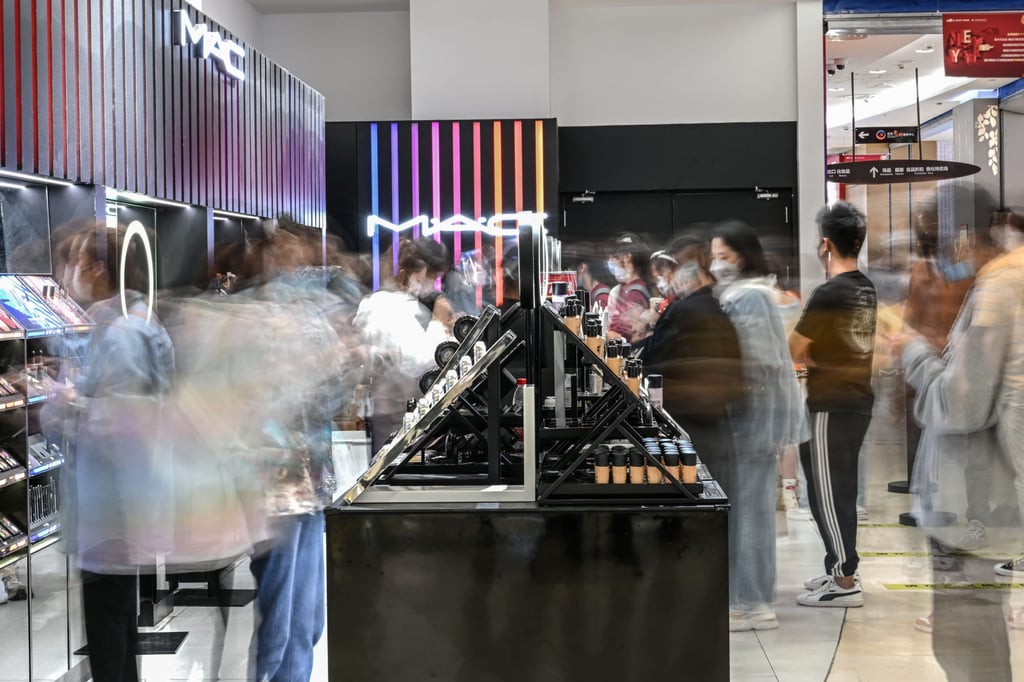 Customers select cosmetics in a duty-free shop in Haikou, the capital of south China’s Hainan province. Photo: Xinhua