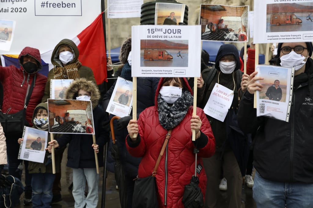 People hold placards during a rally for Benjamin Briere in Paris on January 8. Photo: AP People hold placards during a rally for Benjamin Briere in Paris on January 8. Photo: AP