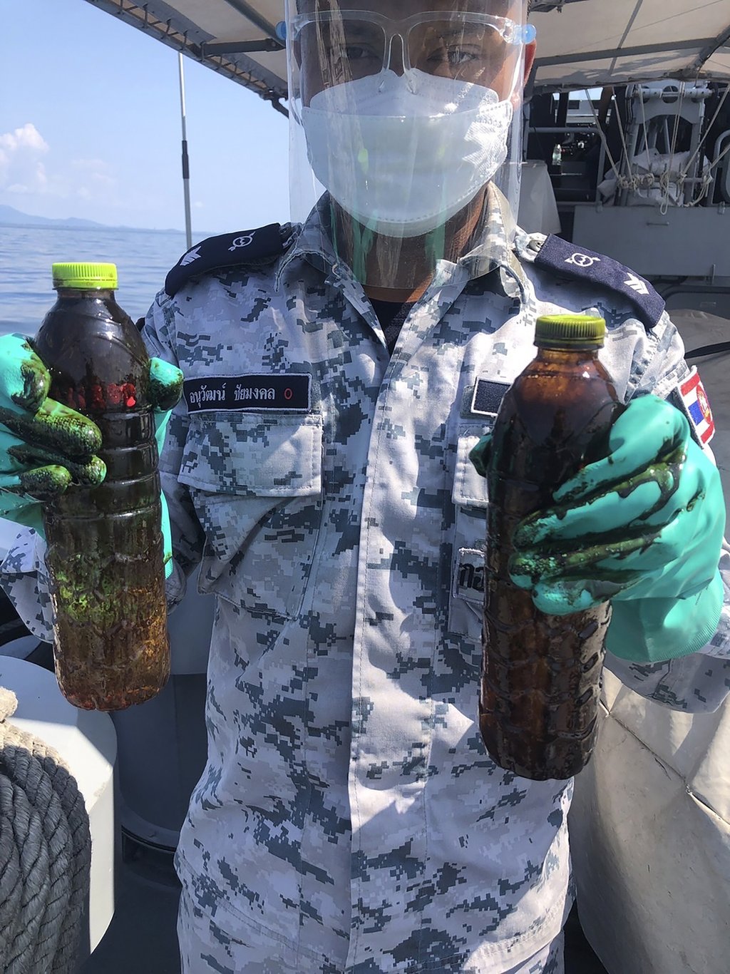 Samples of oil collected from a large oil spill off the coast of Rayong, eastern Thailand. Photo: AP