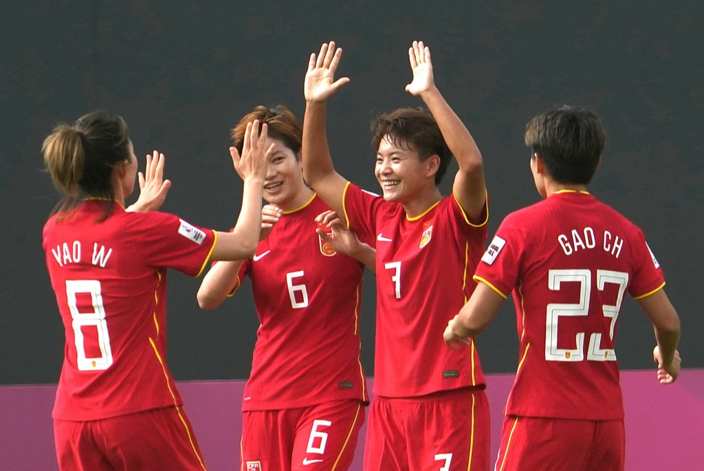 Wang Shuang (Centre) of China celebrates with teammates in a group game against Iran at the 2022 AFC Asian Cup at the Football Arena Mumbai in India. Photo: Xinhua Wang Shuang (Centre) of China celebrates with teammates in a group game against Iran at the 2022 AFC Asian Cup at the Football Arena Mumbai in India. Photo: Xinhua