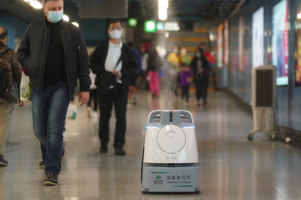 A robot conducts deep cleaning and disinfection at Mei Foo MTR station. Photo: Sam Tsang A robot conducts deep cleaning and disinfection at Mei Foo MTR station. Photo: Sam Tsang