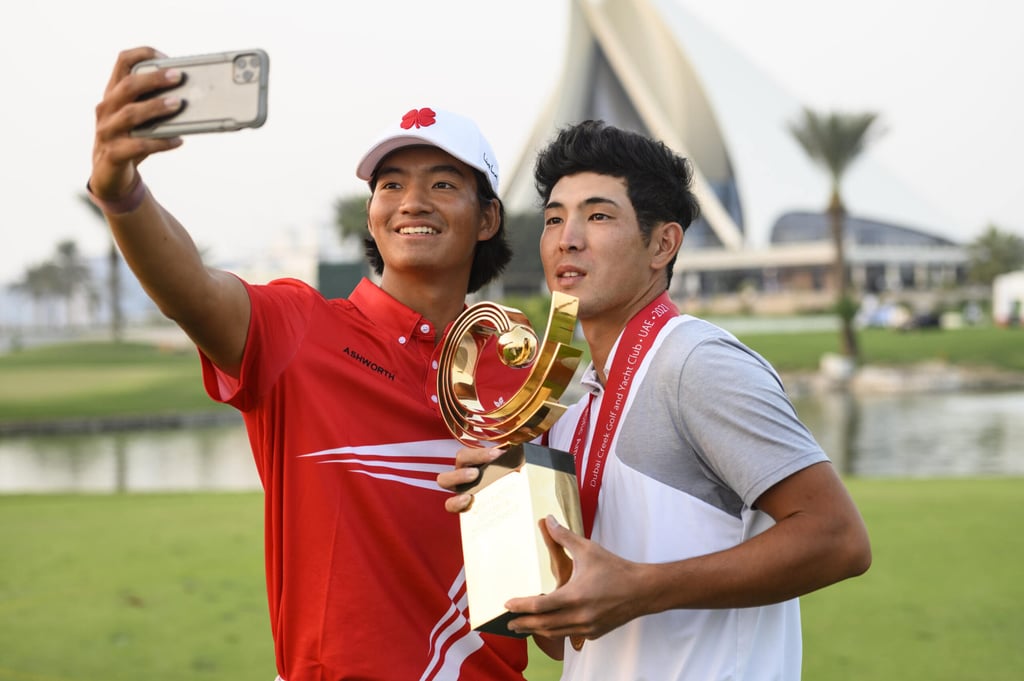 Taichi Kho takes a selfie with Keita Nakajima after the Japanese golfer beat him in a playoff to win the Asia-Pacific Amateur Championship in Dubai. Photograph by AAC