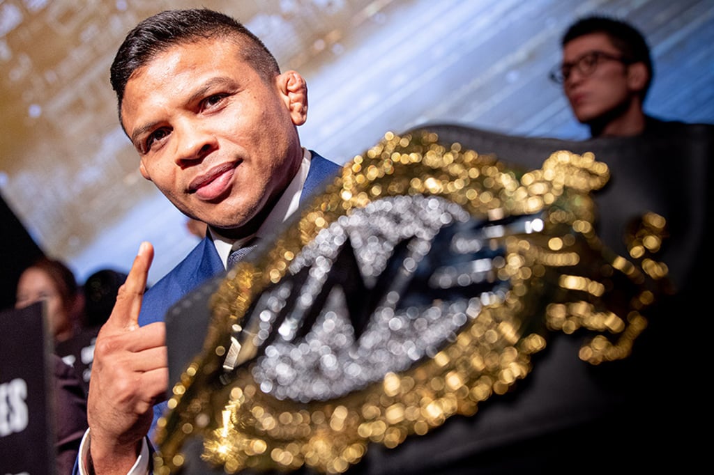 Bibiano Fernandes with his title at a ONE press conference.