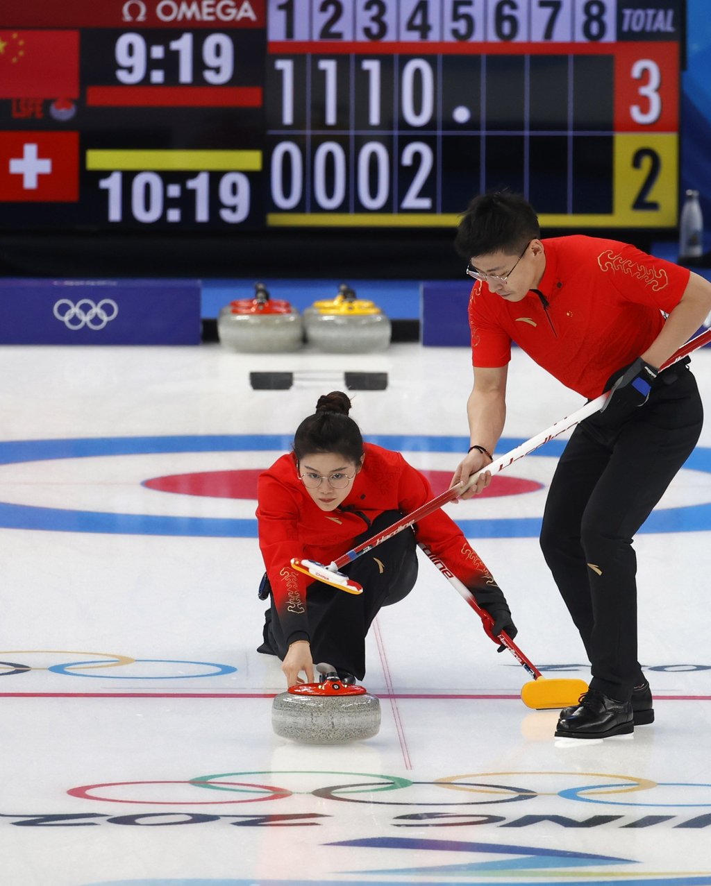 Fan Suyuan Fan (left) and Ling Zhi of China in action against Switzerland. Photo: EPA-EFE