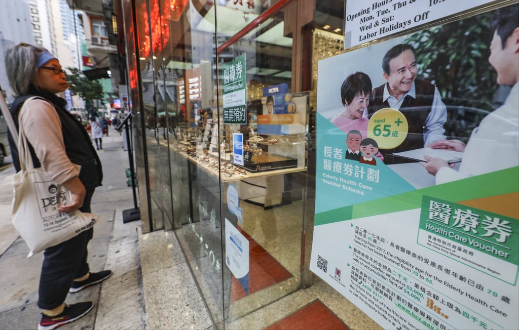 A poster on the health care voucher scheme is displayed at an eyewear shop in Wan Chai in March 2019. Photo: Sam Tsang