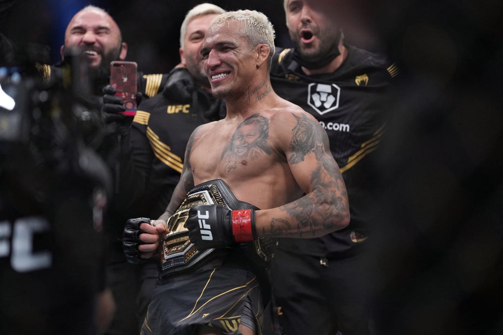 Charles Oliveira celebrates his victory by submission against Dustin Poirier at UFC 269. Photo: Stephen R Sylvanie/USA TODAY Sports Charles Oliveira celebrates his victory by submission against Dustin Poirier at UFC 269. Photo: Stephen R Sylvanie/USA TODAY Sports