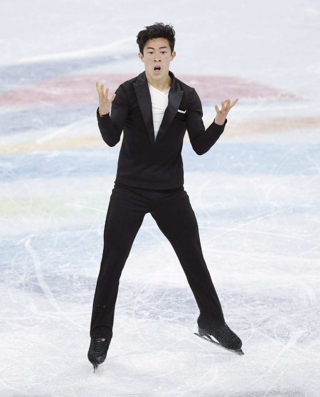 Nathan Chen celebrates after completing his short programme in the figure skating team event at the Capital Indoor Stadium. Photo: Kyodo