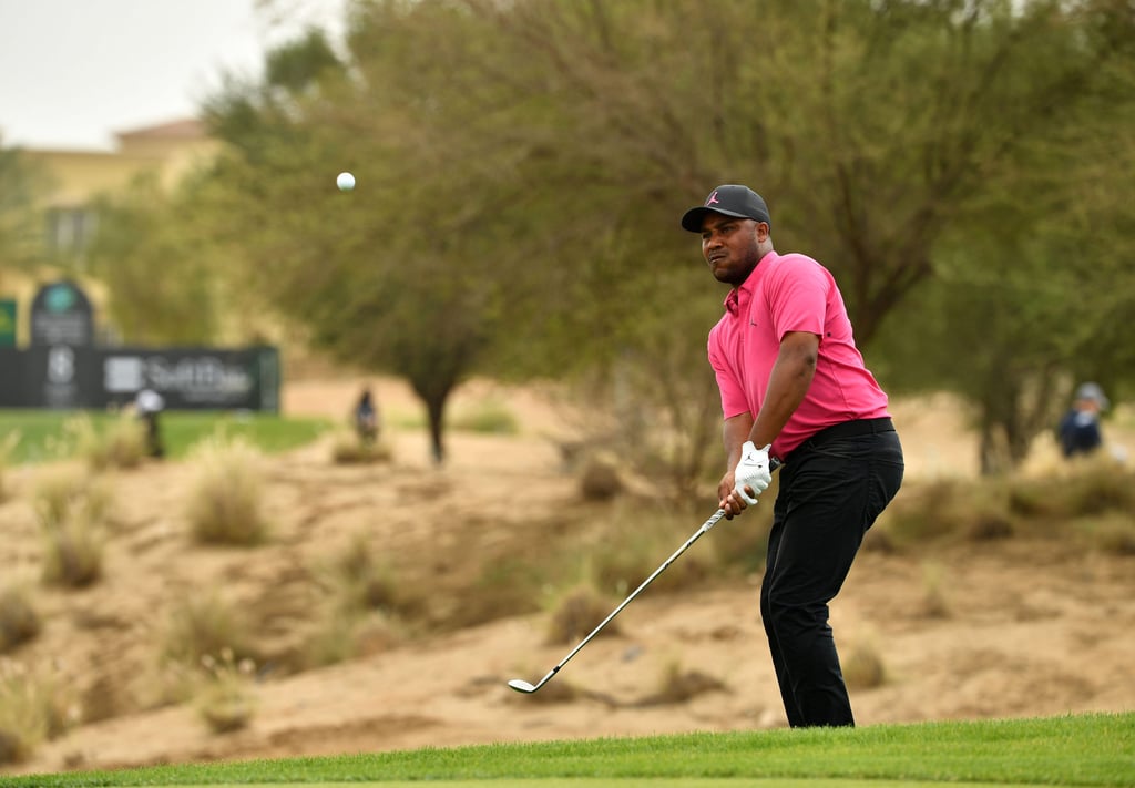 Harold Varner III chips onto a green during the second round of the PIF Saudi International. Photo: Paul Lakatos/Asian Tour.