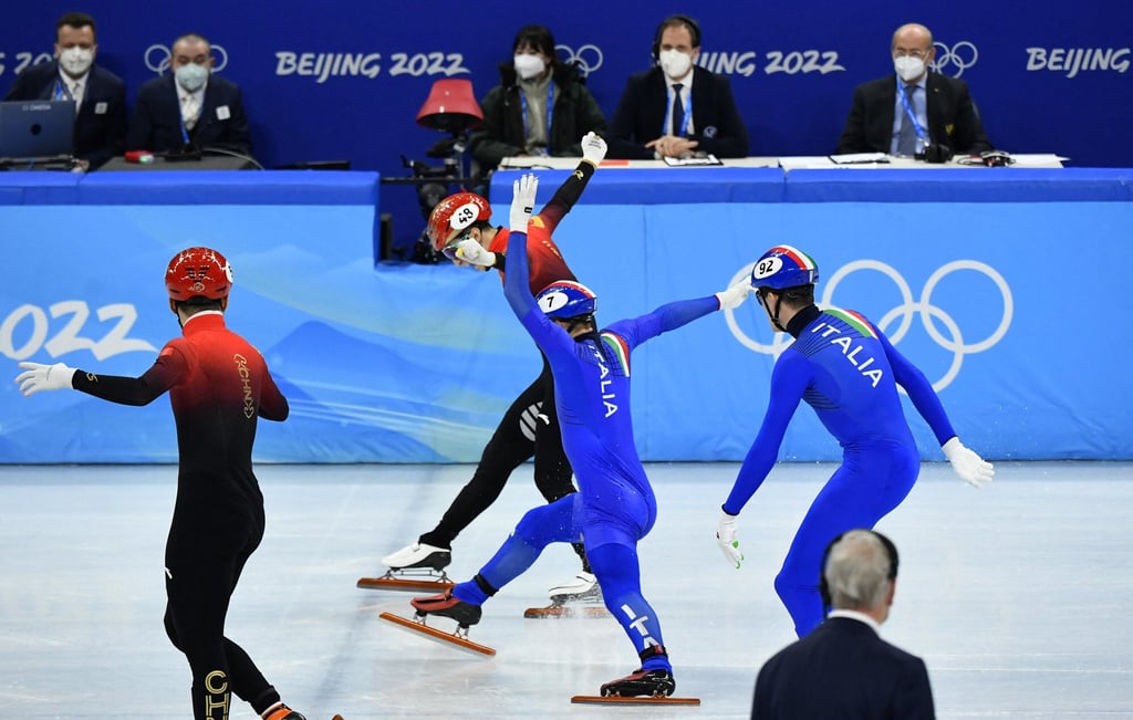 Wu Dajing crosses the line just ahead of Pietro Sighel of Italy. Photo: Reuters
