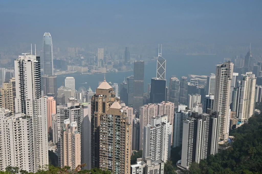 A veil of smog hangs over a view of the Hong Kong skyline on December 29, 2021. Photo: AFP