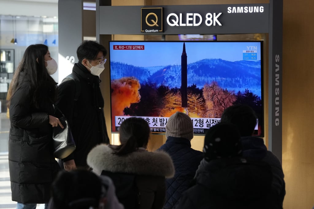 North Koreans watch a news programme showing a missile launch on January 31, 2022. Photo: AP North Koreans watch a news programme showing a missile launch on January 31, 2022. Photo: AP