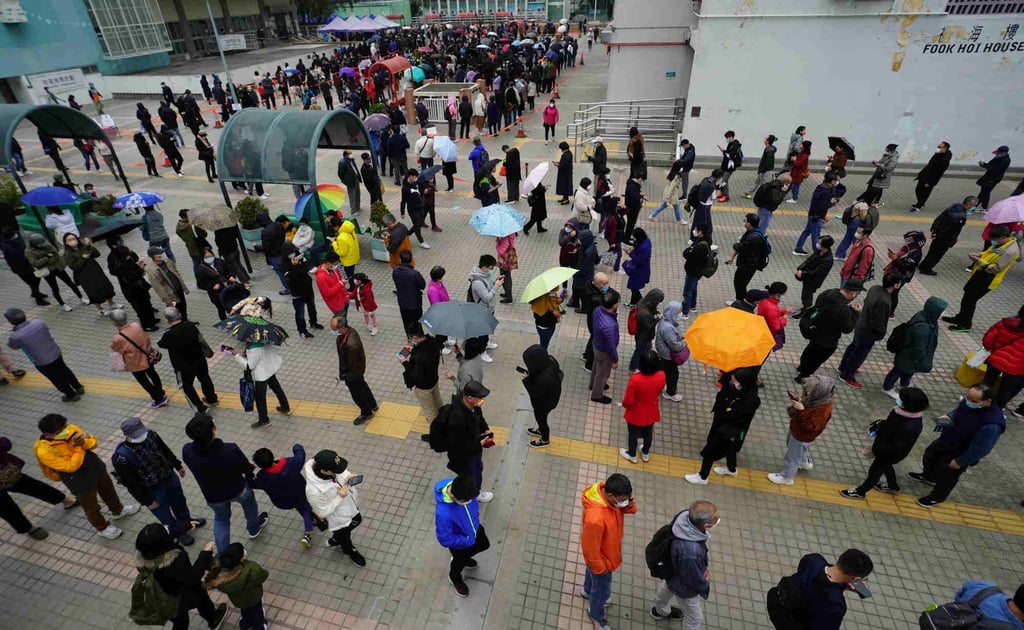 Long lines form as residents wait at a mobile testing station in Hong Kong. Photo: Felix Wong Long lines form as residents wait at a mobile testing station in Hong Kong. Photo: Felix Wong