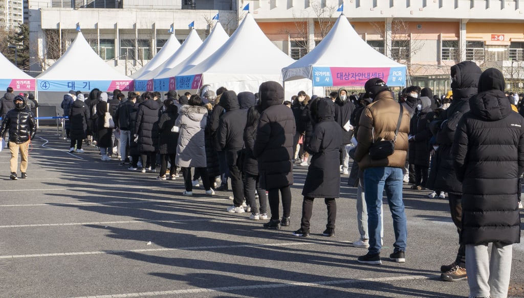 People wait to take Covid-19 tests in Seoul, South Korea, on Sunday. Photo: Xinhua People wait to take Covid-19 tests in Seoul, South Korea, on Sunday. Photo: Xinhua
