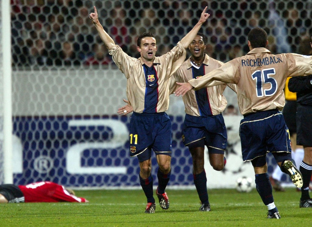 Barcelona’s Marc Overmars (centre) celebrates scoring against Bayer Leverkusen in 2002. Photo: Reuters Barcelona’s Marc Overmars (centre) celebrates scoring against Bayer Leverkusen in 2002. Photo: Reuters