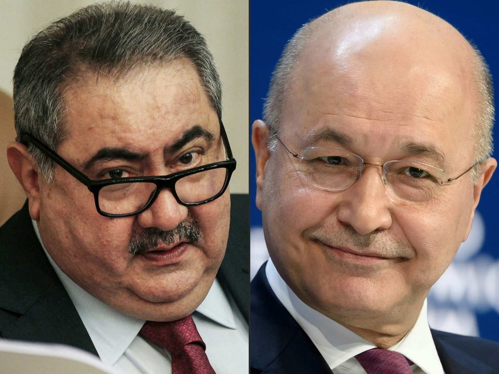 Former Iraqi deputy prime minister Hoshyar Zebari, left, and Iraqi President Barham Saleh. Photo: AFP