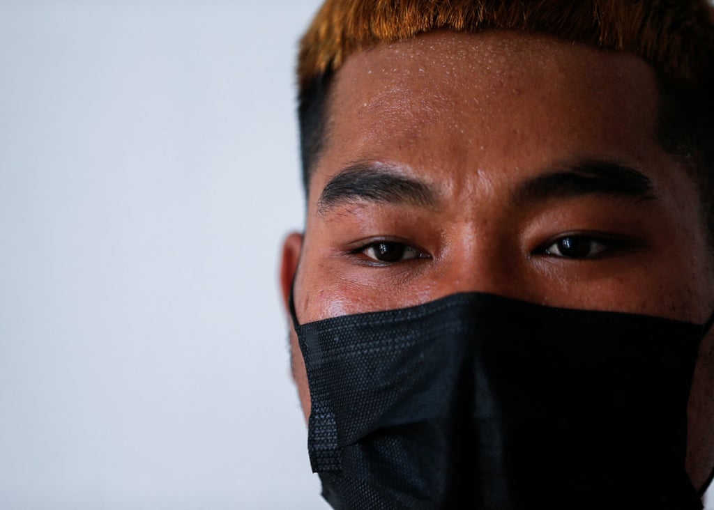 Lin Lin Bo Bo, whose parents cut ties with him, talks during an interview at the Thai-Myanmar border last month. Photo: Reuters