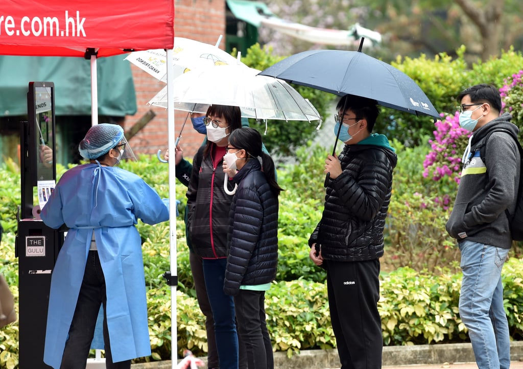 People wait for Covid-19 tests in Hong Kong. The public cannot reasonably question the need for proven effective measures such as full vaccination and social distancing, and then demand to know why the government has not brought the coronavirus crisis under control. Photo: Xinhua