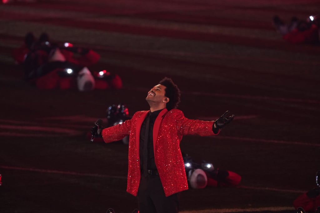 The Weeknd performs in front of fans during the half-time show for Super Bowl LV in 2021. Photo: TNS The Weeknd performs in front of fans during the half-time show for Super Bowl LV in 2021. Photo: TNS