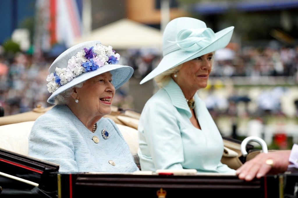 Britain’s Queen Elizabeth and Camilla, the Duchess of Cornwall, arrive by horse and carriage at Ascot Racecourse in 2019. Photo: Reuters