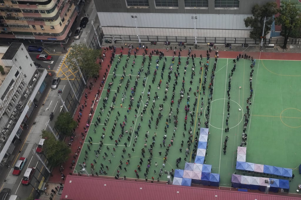 Residents queuing to get tested for the coronavirus at a temporary facility in Hong Kong on Wednesday, Feb. 9, 2022. Photo: AP Residents queuing to get tested for the coronavirus at a temporary facility in Hong Kong on Wednesday, Feb. 9, 2022. Photo: AP