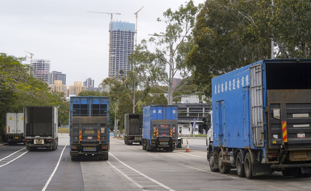 Cross-border trucks at Man Kam To Control Point in Sheung Shui on Tuesday. Photo: Sam Tsang Cross-border trucks at Man Kam To Control Point in Sheung Shui on Tuesday. Photo: Sam Tsang
