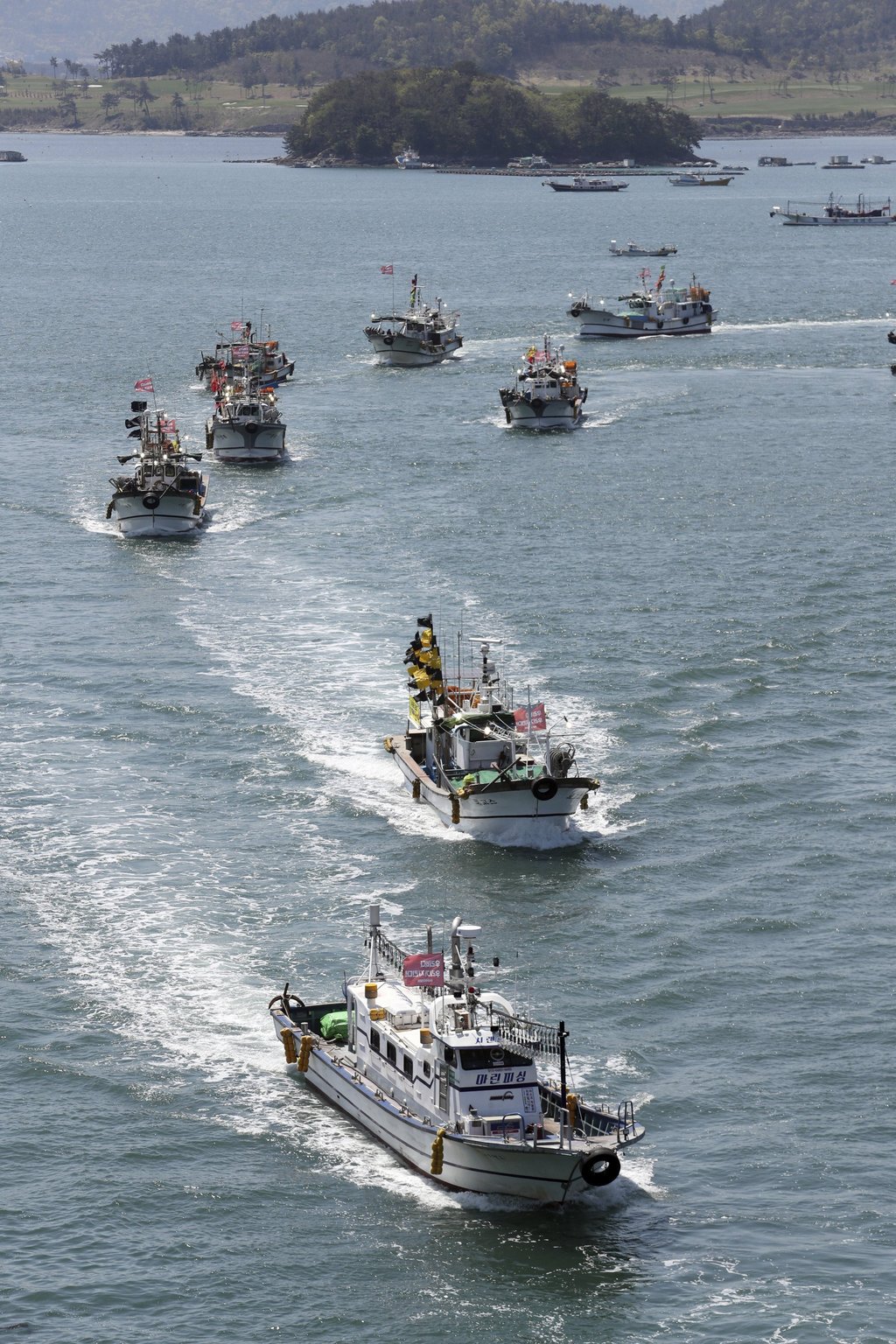 Fishing boats off South Korea parade to denounce the Japanese government’s decision to release treated radioactive Fukushima water. Tokyo said in April 2021 it would start releasing treated water from the wrecked nuclear plant into the ocean in two years, a move condemned by fishermen, residents and Japan’s neighbours. File photo: via AP