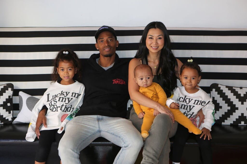 Tracy Romulus with husband Ray and children Raf, Remi and Ryan. Photo: @tracyromulus/Twitter Tracy Romulus with husband Ray and children Raf, Remi and Ryan. Photo: @tracyromulus/Twitter