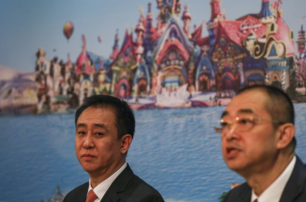 Xia Haijun (right) is seated next to founder and chairman Hui Ka-yan, during a media briefing in Hong Kong, in March 2019. Photo: Nora Tam