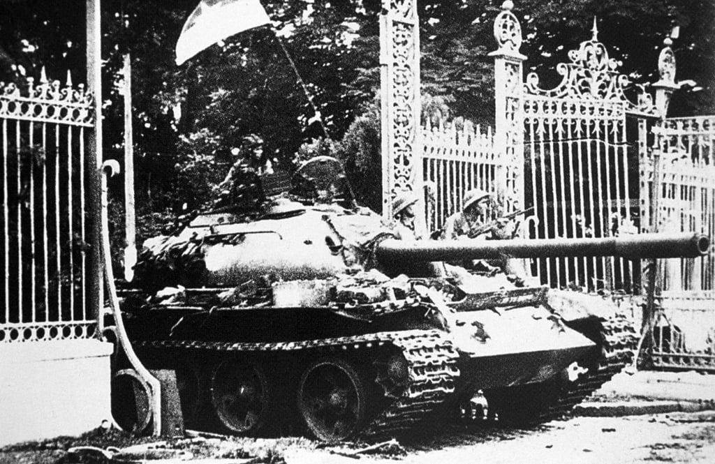 A communist tank enters the presidential palace grounds in Saigon, Vietnam, on April 30, 1975. Picture: Getty Images A communist tank enters the presidential palace grounds in Saigon, Vietnam, on April 30, 1975. Picture: Getty Images