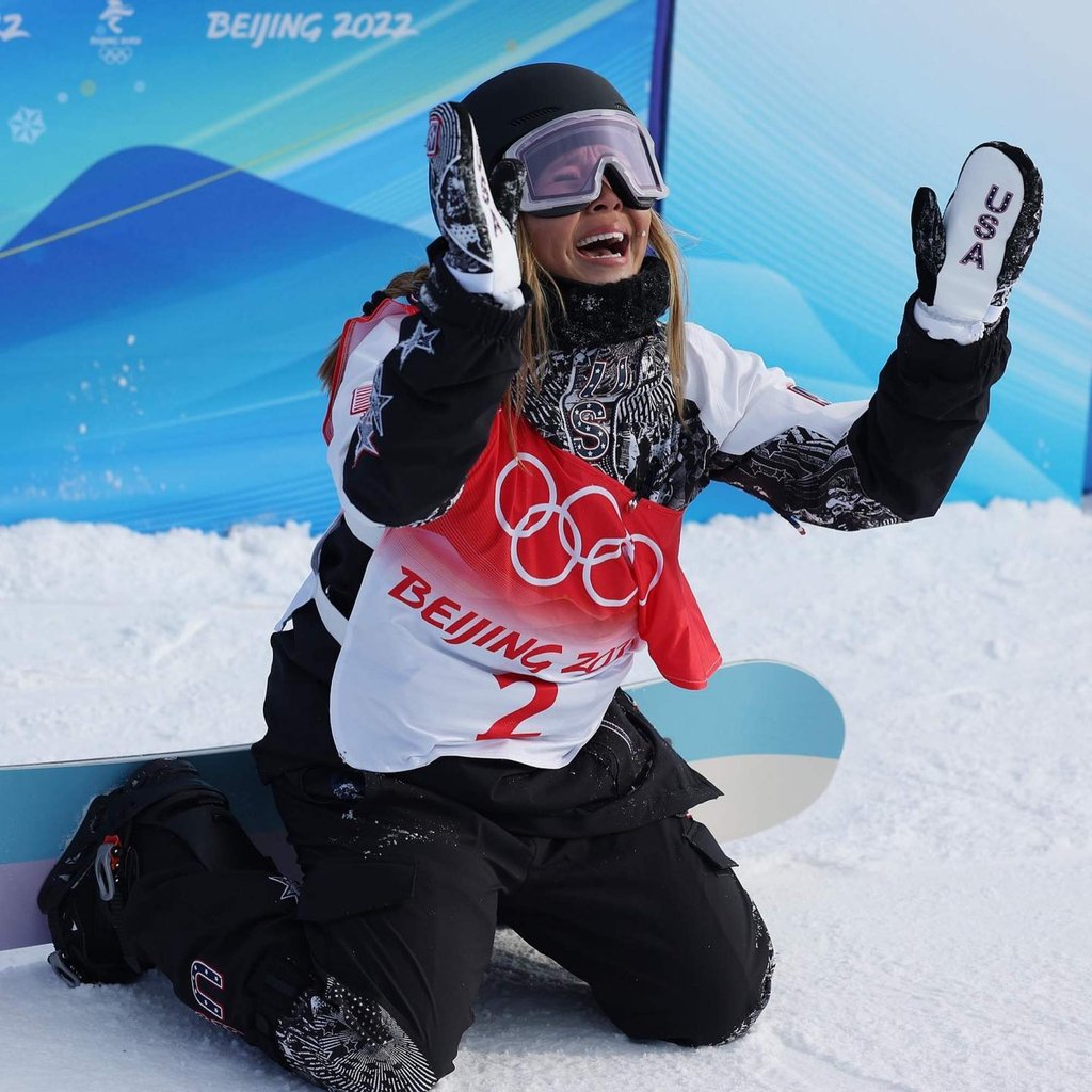 Chloe Kim celebrating taking gold in the half-pipe snowboarding at the 2022 Beijing Winter Olympics. Photo: @olympics/Instagram