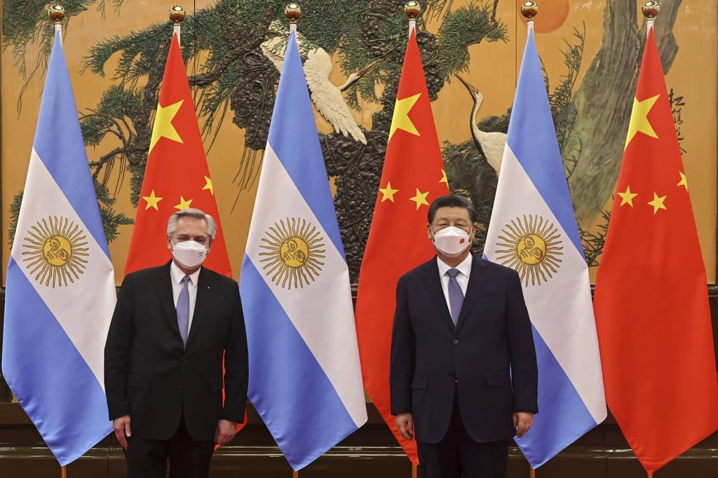 Argentina’s President Alberto Fernandez poses for a photo with Chinese leader Xi Jinping before their meeting in Beijing on Sunday. Photo: AP