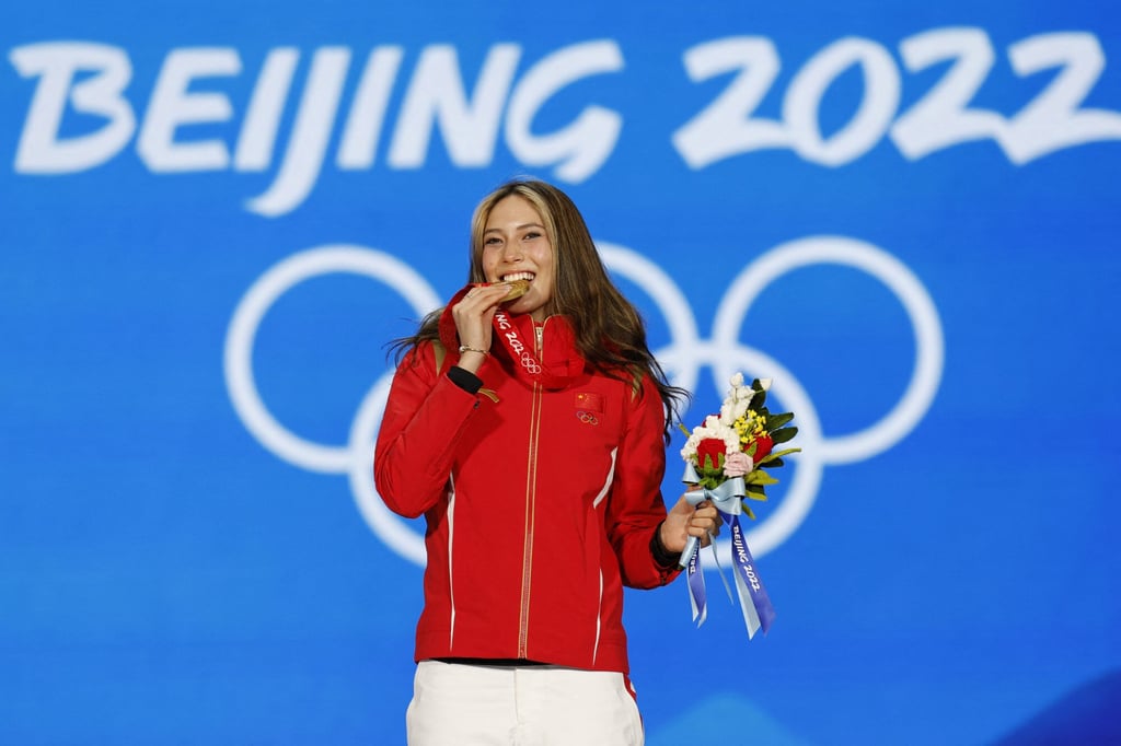 Gold medallist Eileen Gu Ailing of China celebrates on the podium at the 2022 Beijing Winter Olympic Games. Photo: Reuters Gold medallist Eileen Gu Ailing of China celebrates on the podium at the 2022 Beijing Winter Olympic Games. Photo: Reuters