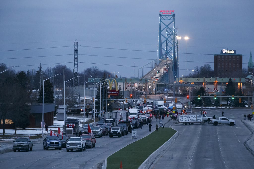 Protestors at the Ambassador Bridge, sealing off the flow of commercial traffic over the bridge into Canada from Detroit, on February 10, in Windsor, Canada. Photo: TNS Protestors at the Ambassador Bridge, sealing off the flow of commercial traffic over the bridge into Canada from Detroit, on February 10, in Windsor, Canada. Photo: TNS