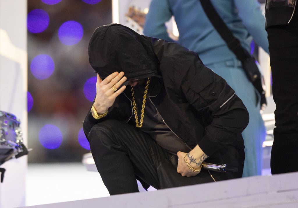 Eminem kneels as he performs during the halftime show at Super Bowl LVI between the Los Angeles Rams and the Cincinnati Bengals at SoFi Stadium in California, on February 13. Photo: USA Today Sports Eminem kneels as he performs during the halftime show at Super Bowl LVI between the Los Angeles Rams and the Cincinnati Bengals at SoFi Stadium in California, on February 13. Photo: USA Today Sports