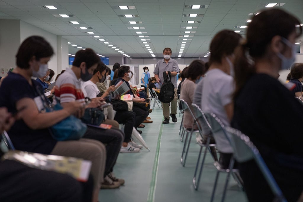 People wait in an observation area after receiving the Moderna vaccine in Tokyo. File photo: Getty Images/TNS People wait in an observation area after receiving the Moderna vaccine in Tokyo. File photo: Getty Images/TNS