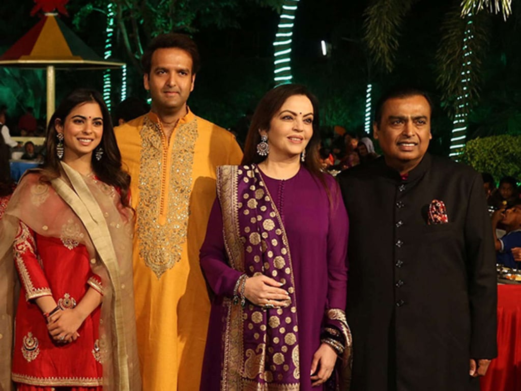 Mukesh Ambani, right, and his family.