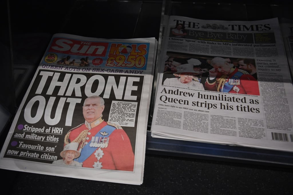 Newspapers display front page headlines and stories of Britain’s Prince Andrew after his titles were removed by his mother, Queen Elizabeth, in January. Photo: EPA