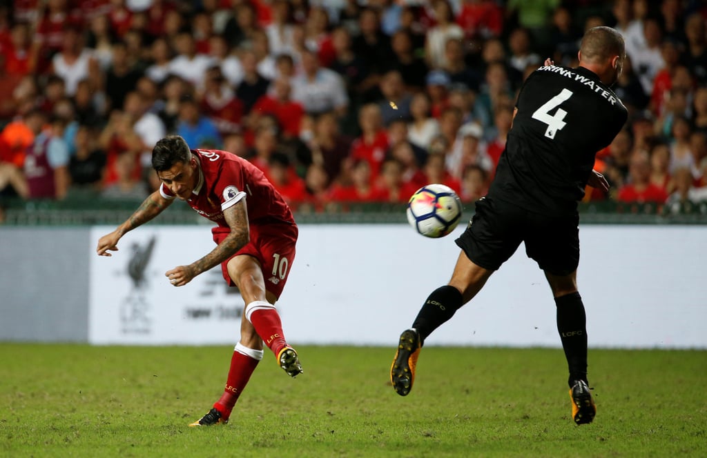 Liverpool’s Coutinho shoots at goal as Danny Drinkwater, of Leicester City, attempts a save at the 2017 Asia Trophy final at Hong Kong Stadium. Photo: Reuters