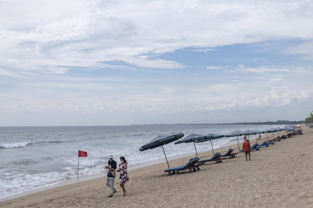 A nearly empty beach in Kuta, Bali. The Indonesian holiday island began a tentative reopening to foreign tourists on February 16. Photo: EPA