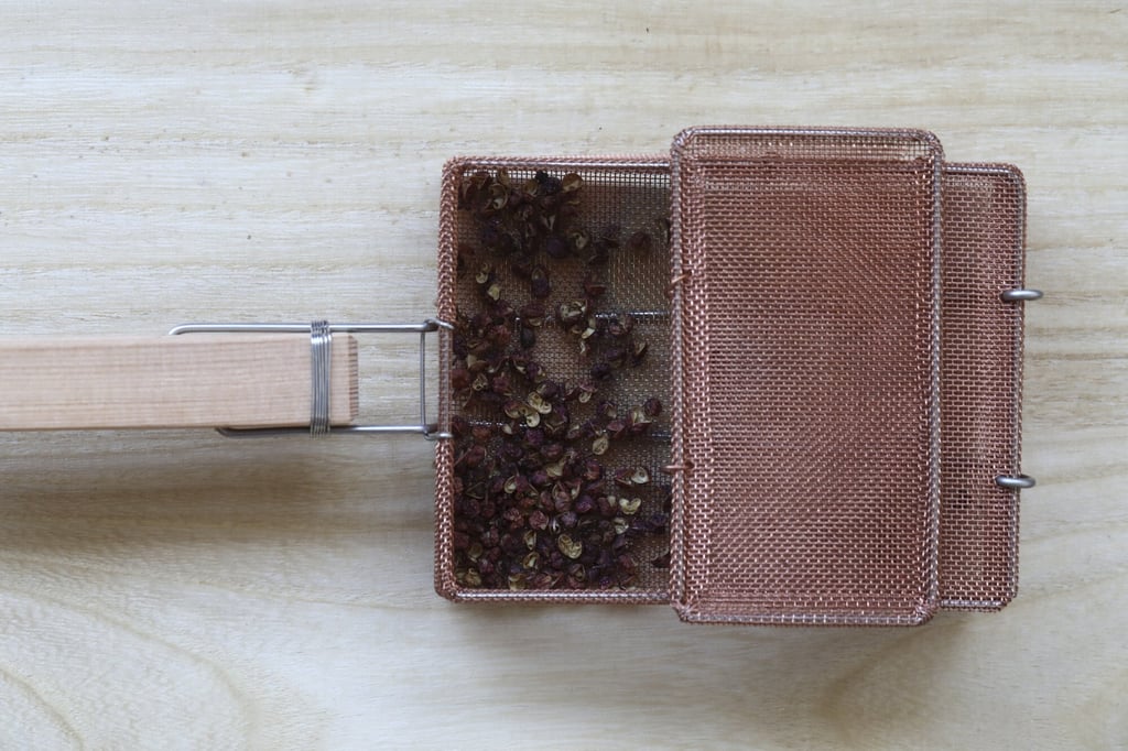 Toast the Sichuan peppercorns. Photo: Jonathan Wong Toast the Sichuan peppercorns. Photo: Jonathan Wong